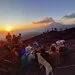 Hikers crossing the lava field of Pacaya volcano on a guided tour from Antigua